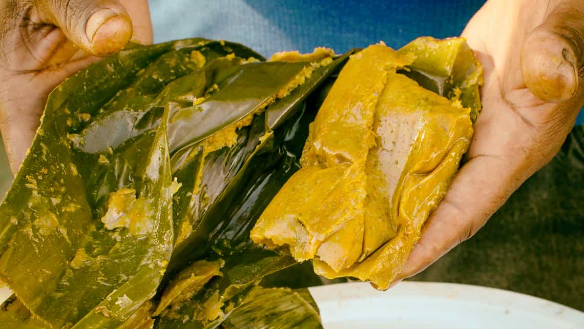 Tamal de maiz envuelto en hojas de platano, plato tipico de Baracoa