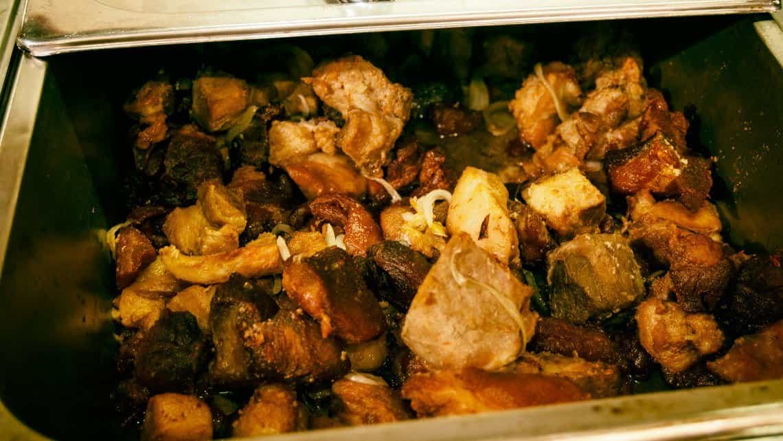 Masa y 'empellas' de cerdo frito, ingrediente infaltable del tamal cubano 